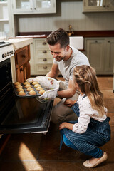 Kitchen, child and dad with smile, oven and bonding with baking, muffins and girl with curiosity...