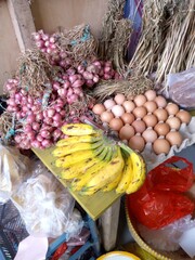 photos of goods sold at traditional markets in the form of bananas, shallots, garlic and others