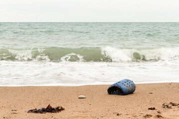 Plastic lobster or crab pot on the shore