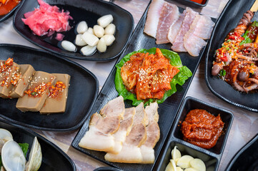 Fermented Skate and Steamed Pork Slices Served with Kimchi
