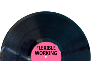 Flexible working symbol. Concept words Flexible working on beautiful purple black vinyl disk. Beautiful white paper background. Business flexible working concept. Copy space.
