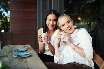 Portrait, coffee and friends in cafe, smile and bonding of women, laughing and happy to relax in weekend. Customer, enjoy and girls with beverage for conversation, morning and break for students