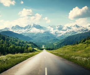 Fototapeta premium Scenic mountain road stretches into the distance on a sunny day