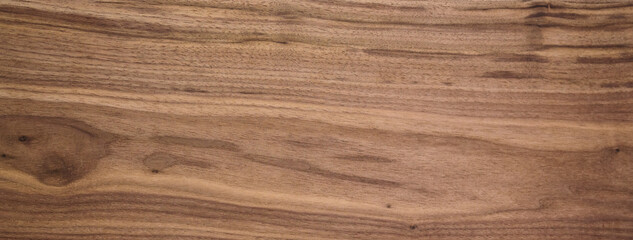 Black walnut wood texture of solid board untreated