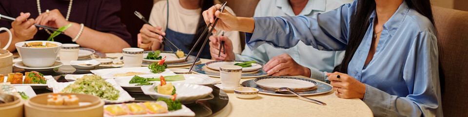 Header with family having dinner in the restaurant