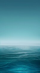 Obraz premium An ocean-inspired gradient wallpaper featuring a seamless ombré effect transitioning from deep turquoise to vibrant sky blue.