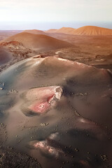 Astunning view of a volcano crater, desert, mountains and volcanoes on the Lanzarote island.