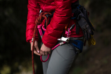 Girl with mountaineering equipment outdoor.
