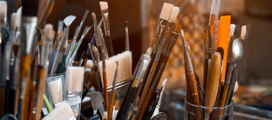 Brushes, art materials for painting, creative artworks closeup.