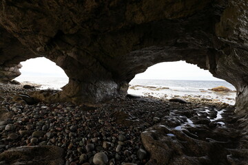 Natural rock arch of Arches Provincial Park at Portland Creek on the coast of Newfoundland's Northern Peninsula