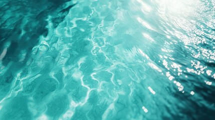 Fototapeta premium Stunning Aerial View of a Pristine Turquoise Pool with Sunlight Glimmers and Ripples, Reflecting a Serene Light Blue Ambiance, Ideal for Relaxation and Leisure