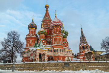 St. Basil's Cathedral in winter on Red Square in Moscow. The entrance to the ancient temple with vaults is decorated with samples. A monument of Russian architecture. An object of cultural heritage.