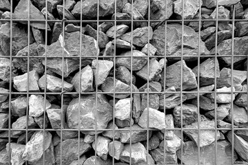 Fence from gabon stones. Close-up.