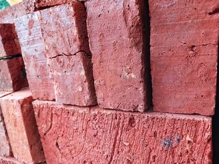 Red brick texture stacked for building materials.