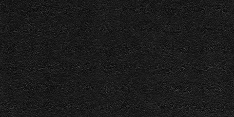 background texture of dark gray asphalt, top view ,asphalt pavement surface, showcasing its...
