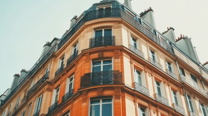 Fototapeta premium Charming Parisian Building Corner with Balcony
