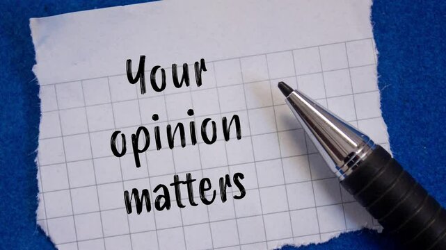 Your opinion matters message writing on ripped torn paper on blue background with a pen. Conceptual your opinion matters symbol.