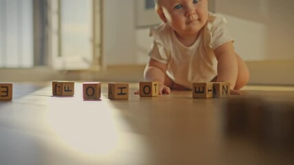 On a sunny bright day, a baby crawls on the kitchen floor, playing with toys. He learns about the world around him, taking his first independent steps. Illustration of the concept of child development
