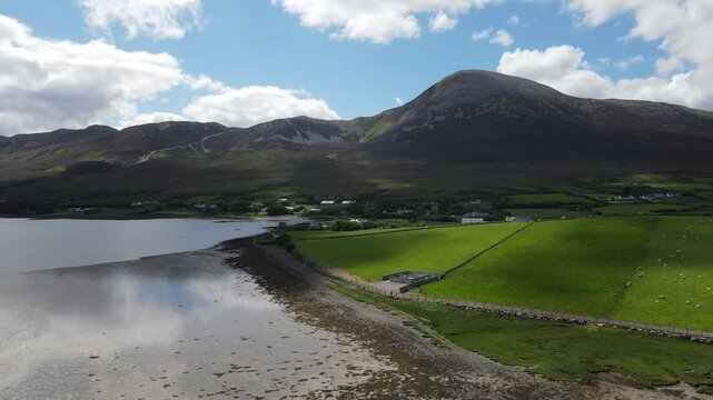 Irish scenery, Croagh Patrick with green fields and Atlantic coastline. Bertra Beach, Westport, Mayo, Ireland