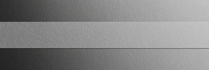 Monochromatic texture showcasing a gradient pattern in shades of grey on a subtle background