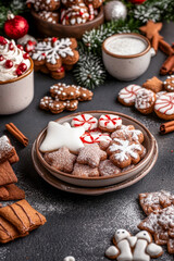 Fototapeta premium Festive Christmas sweets and cookies in holiday decor composition