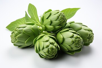 Fototapeta premium Fresh Green Artichokes with Leaves on White Background