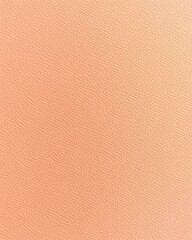 Fototapeta premium Soft peach textured background featuring a smooth gradient for creative design