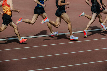 athletics competition group athletes running 800 meters at stadium