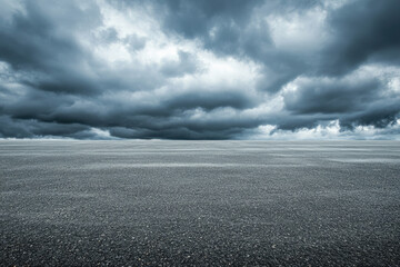 Dark storm clouds gathering over empty asphalt road - Powered by Adobe