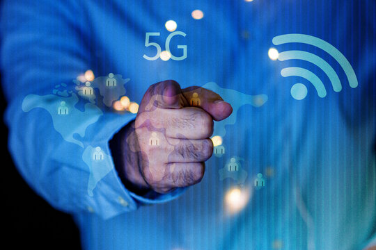 Person holding smartphone with social network icons. Business using smartphone with wifi icon. Social network concept.