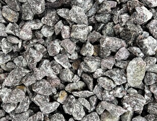 Close-Up of Crushed Stone Aggregates - Rough Textured gravel Background