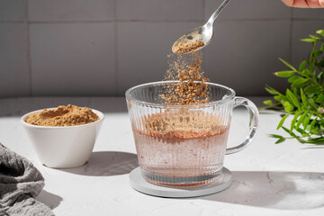 Collagen protein powder drink. Glass of collagen beauty drink. Food supplement.