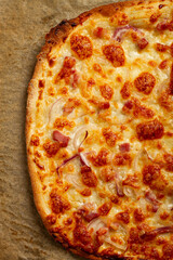 tart flambe, open pie, rectangular pizza, with cheese and red onion, bacon slices, Alsatian dish, homemade, no people,