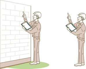 建築作業員・外壁をチェックするシニア男性