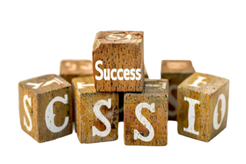 Wooden Cubes Displaying the Word Success Isolated on Transparent Background