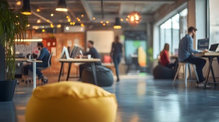A modern office space with professionals working collaboratively, featuring a bright ambiance and casual seating arrangements, ideal for showcasing creative work environments in stock photography. 