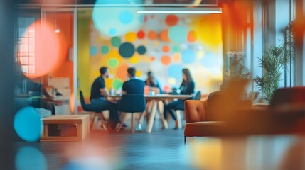 A vibrant office scene featuring a diverse group of professionals engaged in a collaborative discussion around a table, with a colorful mural in the background. 