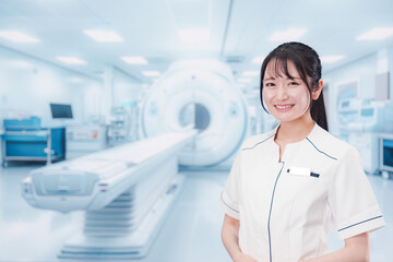 MRI室で働く若い女性技士