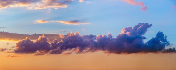 Sky with dark cloud during sunset