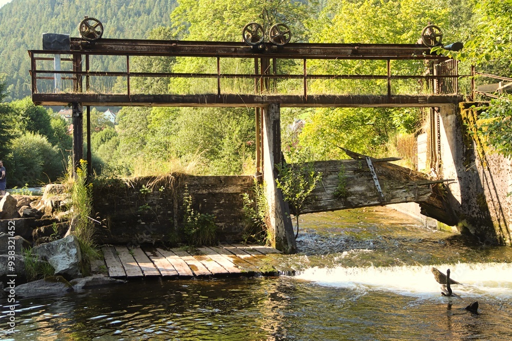 Wall mural altes wehr am fluss aus olz