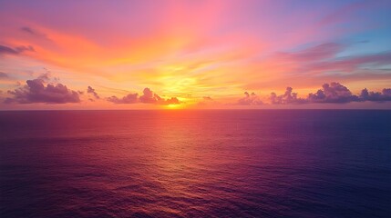 Fototapeta premium High-angle drone shot of a colorful sunset over the ocean.