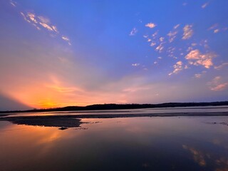 Obraz premium sunset over the river