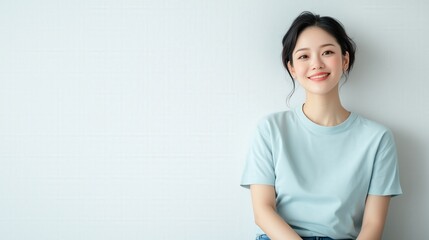 Portrait of a Young Cute Smiling Asian Woman