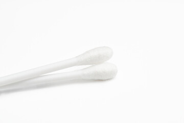 Plastic cotton swabs on white background