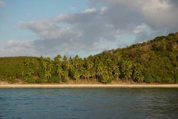 Island beach at sunset in Fiji