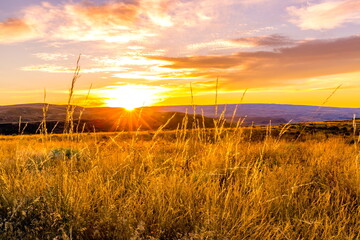 The stunning landscape of Vantage bathed in the intense glow of the sunset. WA-USA
