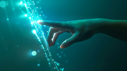 Close-up of a human hand touching a virtual glowing digital screen on a blue background. Concept of technology, future.
