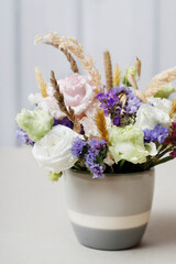 Florist at work: How to make simple floral arrangement with eustoma and limonium. Step by step, tutorial.