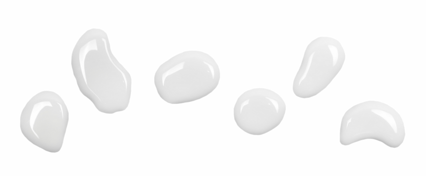 Spilled milk puddle, droplets isolated on white background and texture, top view