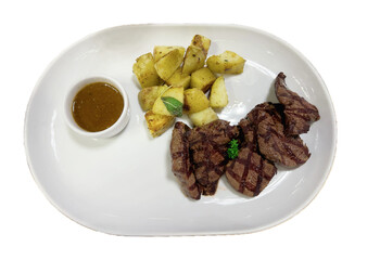 Grilled Steak with Herb-Seasoned Potatoes on White Plate - Isolated Transparent Background